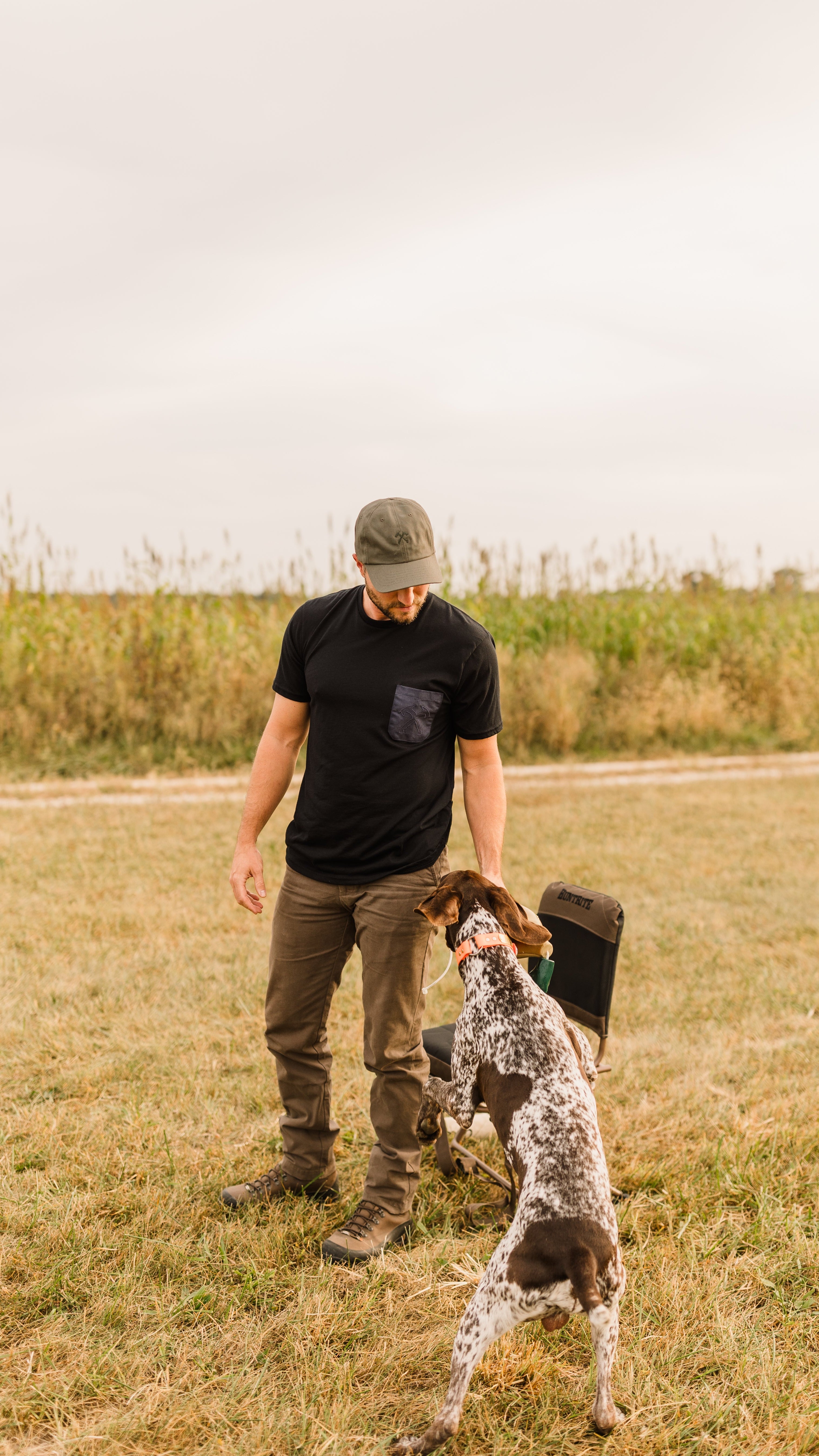 Man in heritage pants and t-shirt