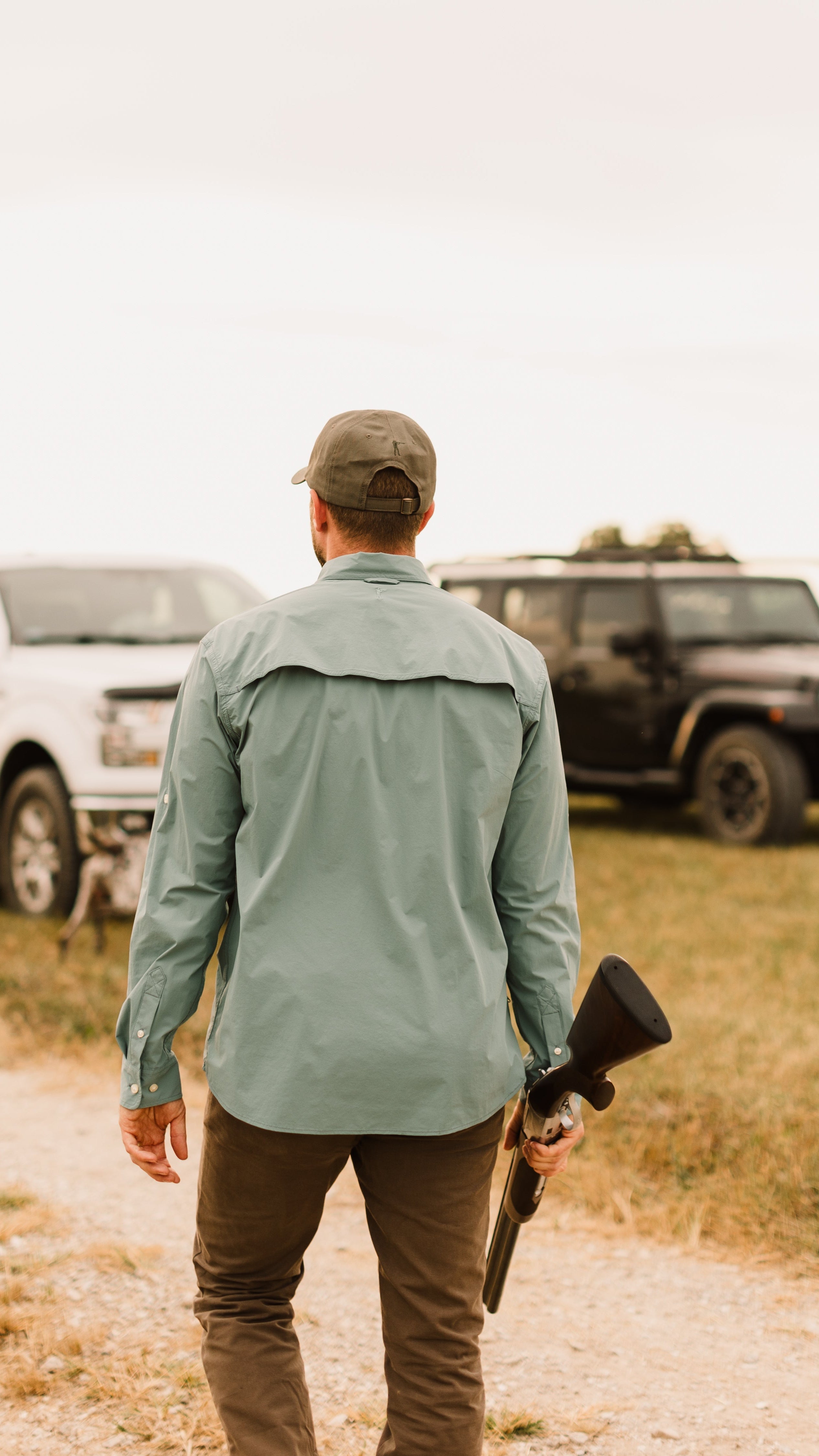 Man in cap, active shirt, and pants